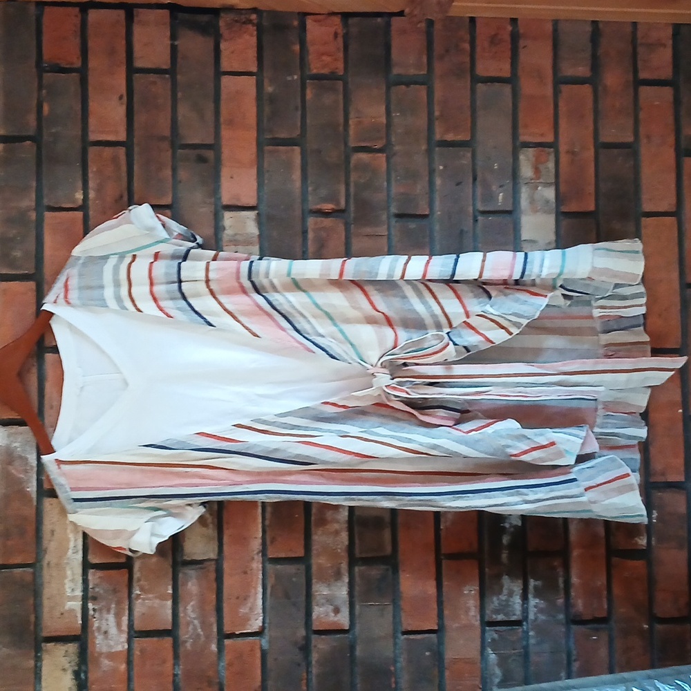 FREE PEOPLE XS ruffledorange. tan,navy blue and oarnge.